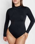 Sara Seamless Long-Sleeve Mock Neck Bodysuit – White Stretch Fit