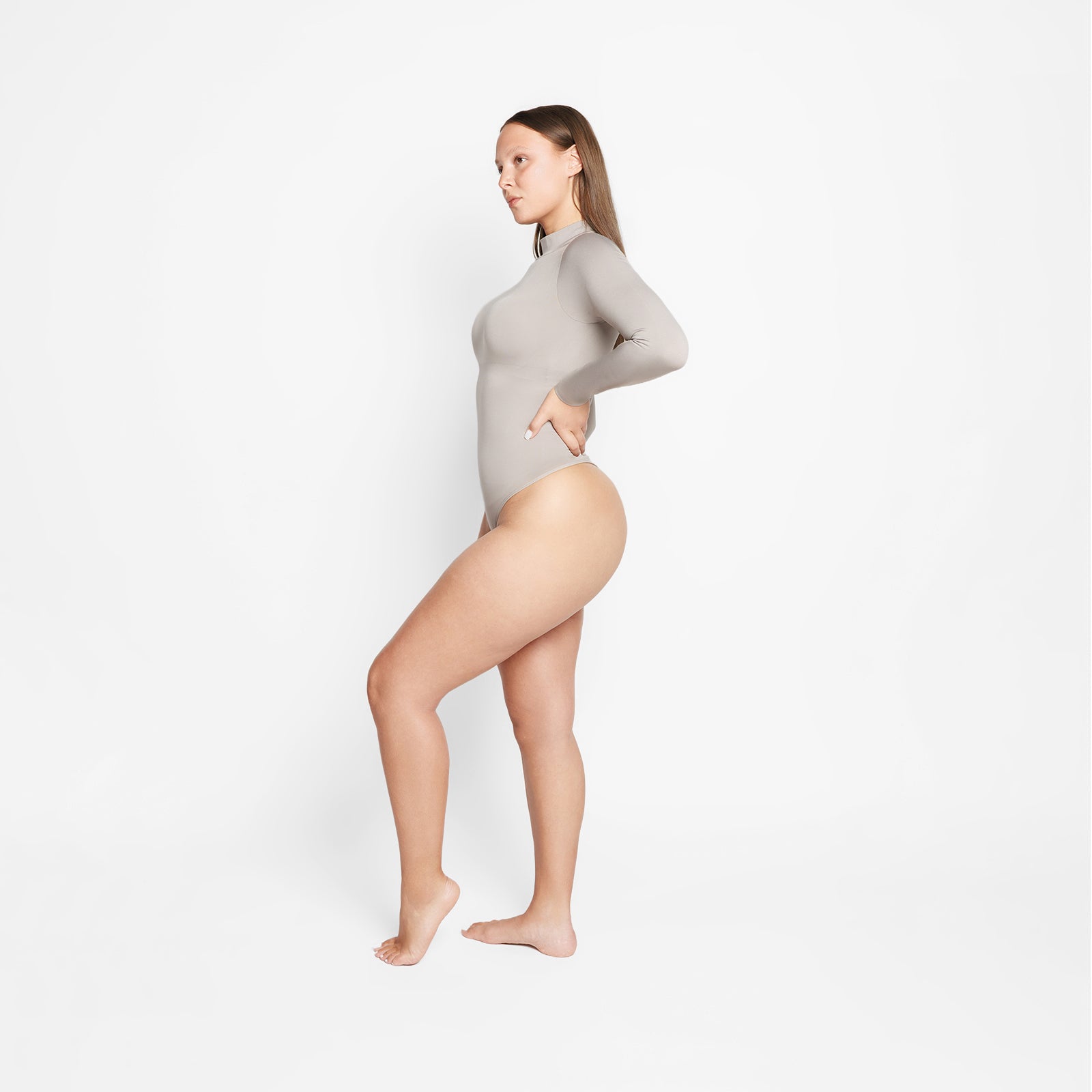Sara Seamless Long-Sleeve Mock Neck Bodysuit – White Stretch Fit