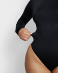 Sara Seamless Long-Sleeve Mock Neck Bodysuit – White Stretch Fit